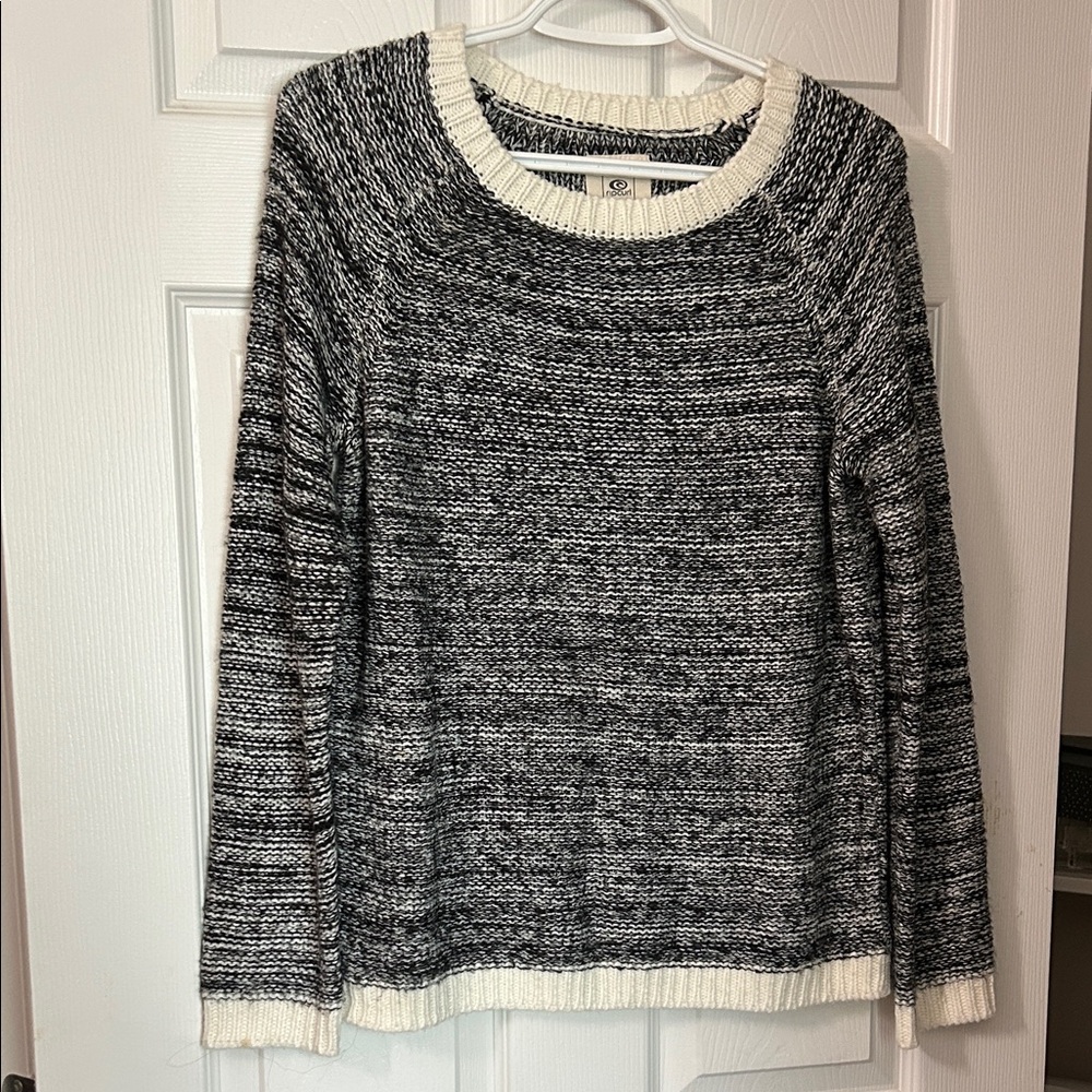 5 marked posts for $10 Rip Curl Black and Cream Crew Neck Sweater